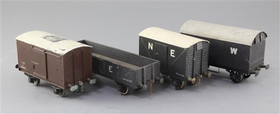 A NE open wagon, no.2573, in grey, an LMS box van, no. 7960, in brown, an NE box van, no.605621, in brown,